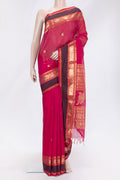 Pink Dual Tone Silk Cotton Saree with Zari Butta on the body and Zari Border.  displayed on a mannequin