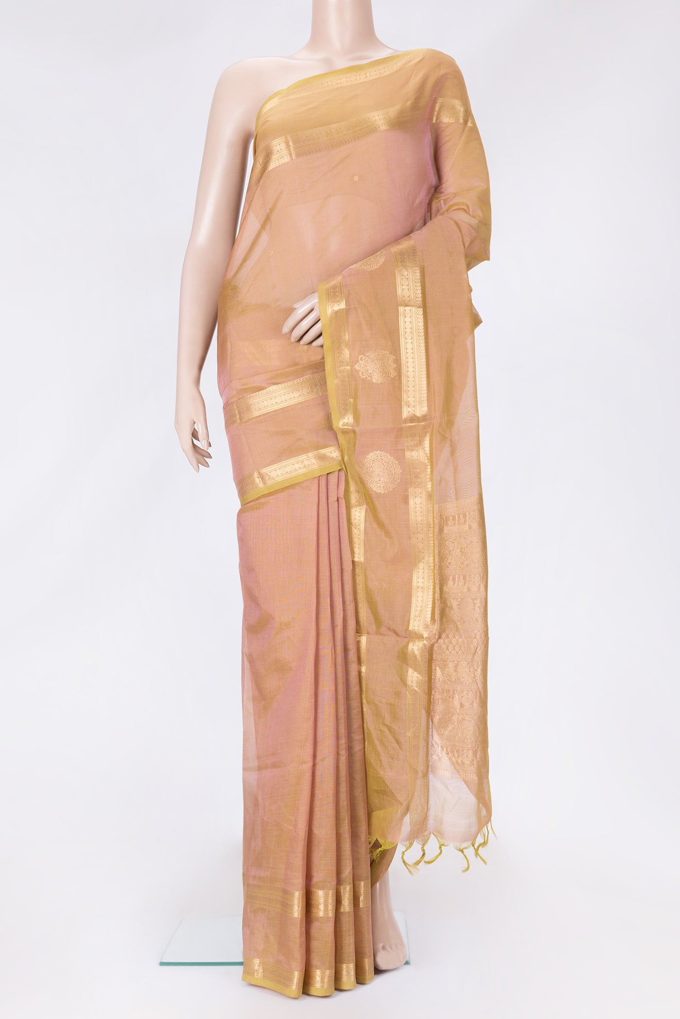 Rose Gold Dual Tone Silk Cotton Saree with Zari Butta on the body and Zari Border.  displayed on a mannequin