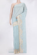 Sky Blue Blended Tussar Silk Saree with Plain Body and Fancy Border.  displayed on a mannequin