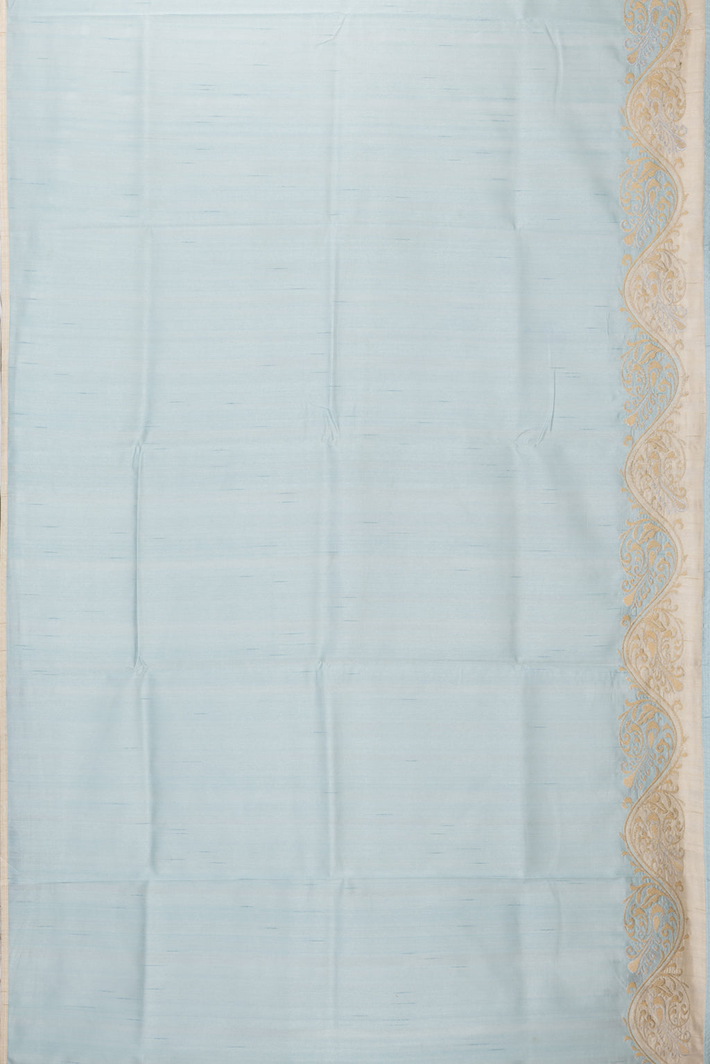 Flat view of Sky Blue Blended Tussar Silk Saree with Plain Body and Fancy Border. 