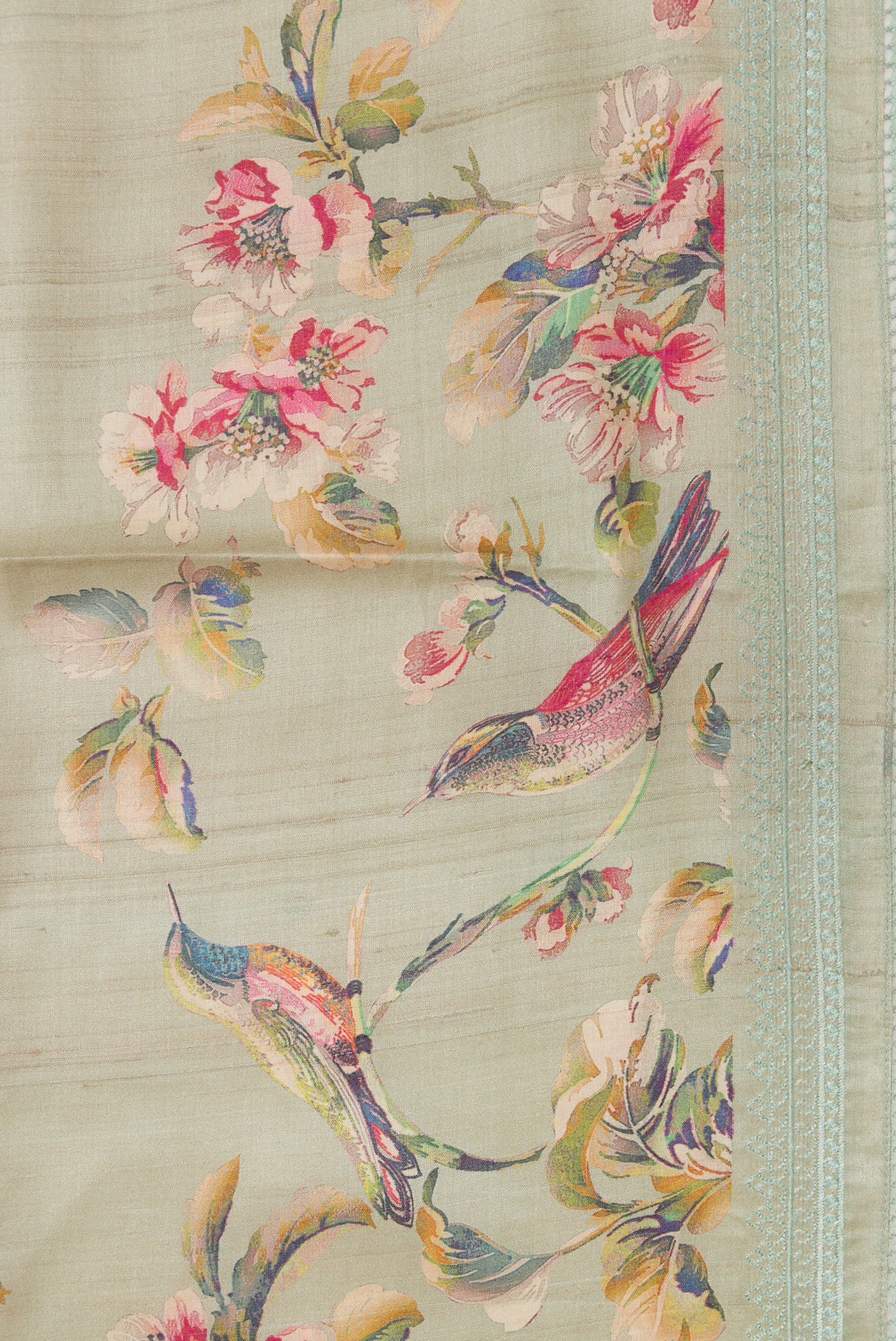 Border image of Grey Dual Tone Tussar Silk Saree with Printed design on the body and Embroidery Border. 