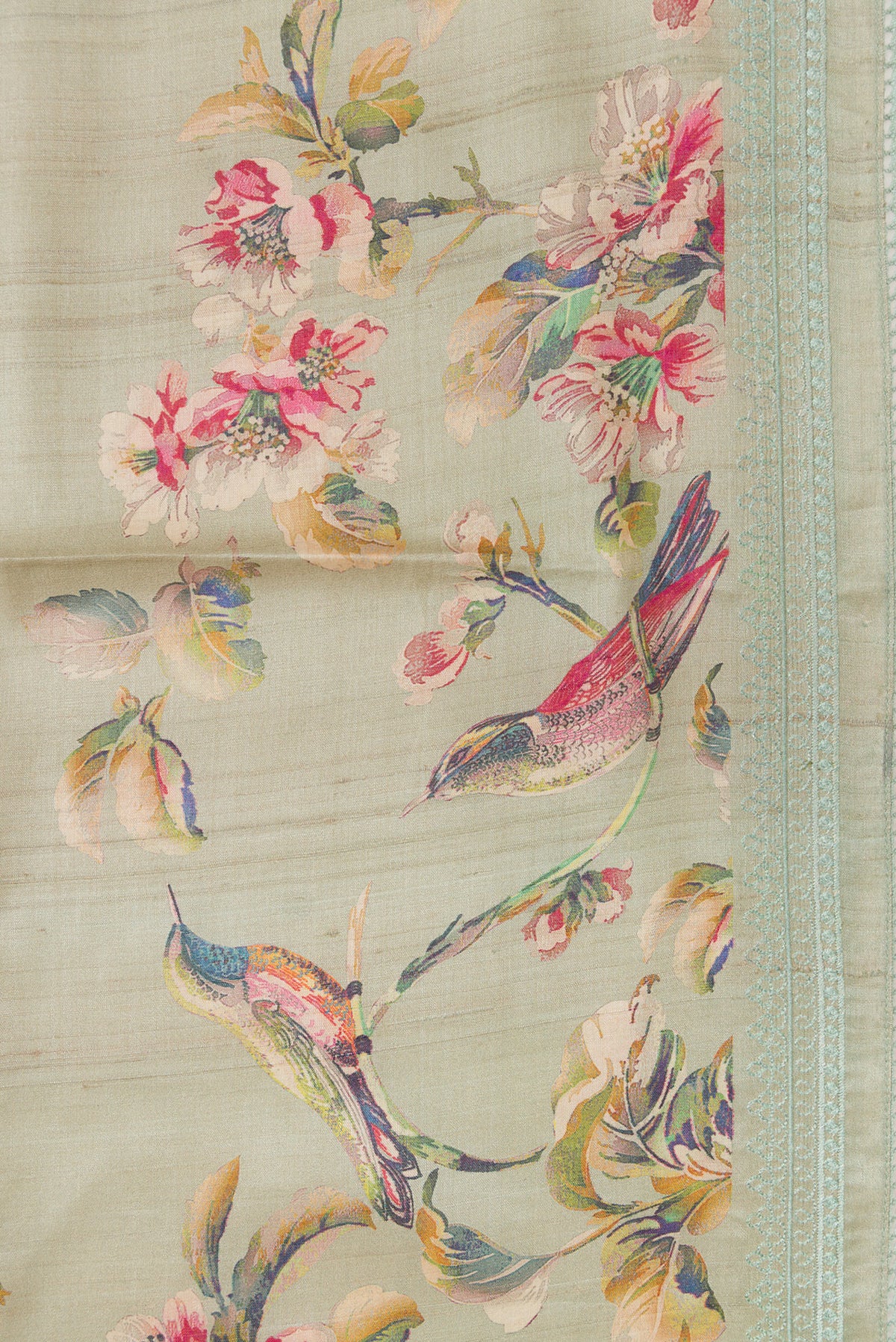 Border image of Grey Dual Tone Tussar Silk Saree with Printed design on the body and Embroidery Border. 