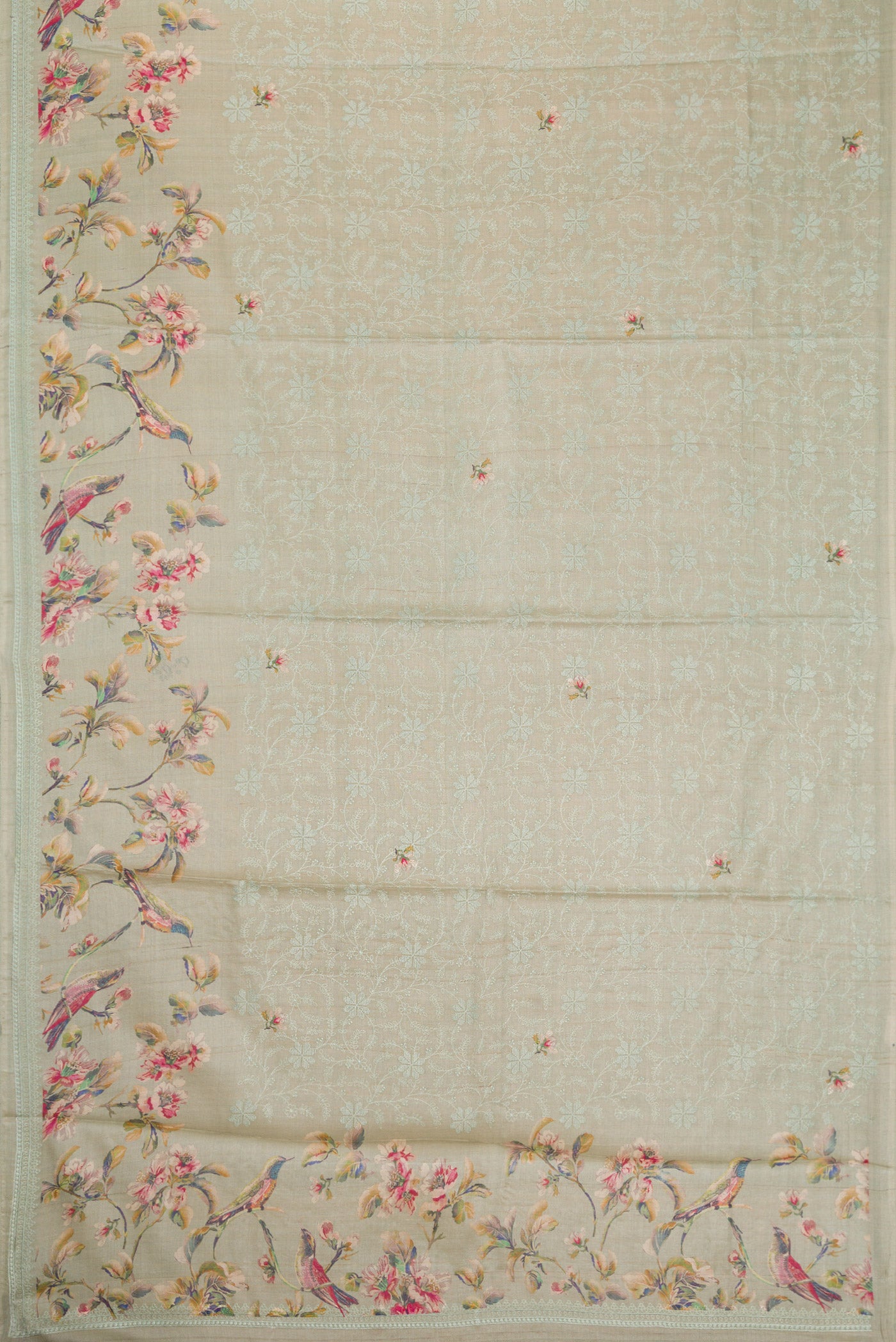 Flat view of Grey Dual Tone Tussar Silk Saree with Printed design on the body and Embroidery Border. 