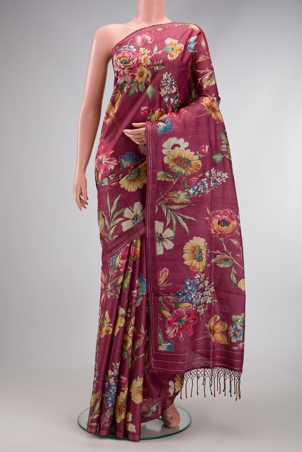Pink Dual Tone Tussar Silk Saree with Printed design on the body and Embroidery Border.  displayed on a mannequin