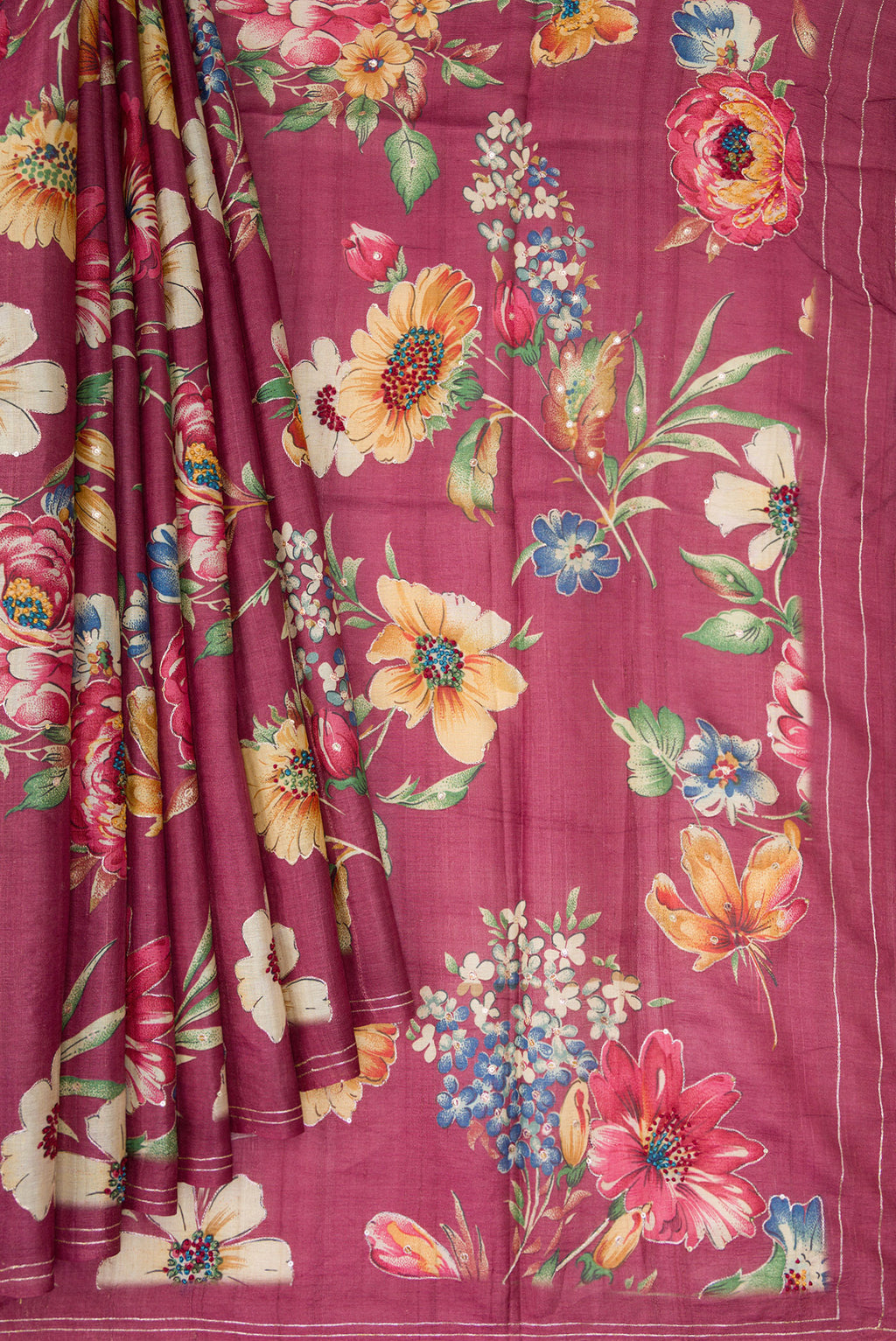Pleats and pallu of Pink Dual Tone Tussar Silk Saree with Printed design on the body and Embroidery Border. 