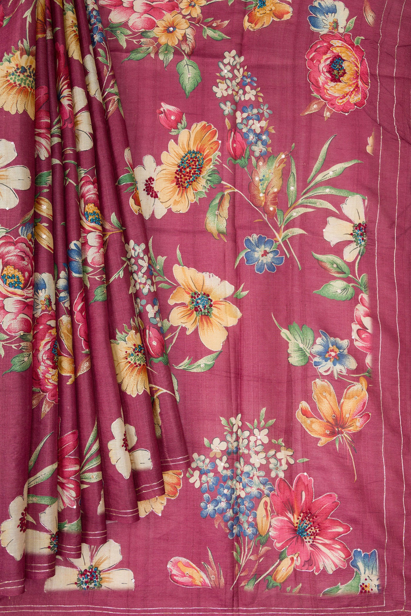 Pleats and pallu of Pink Dual Tone Tussar Silk Saree with Printed design on the body and Embroidery Border. 