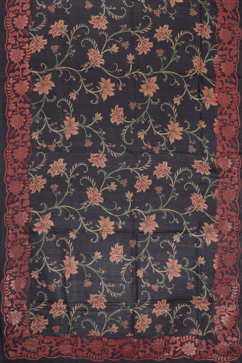 Flat view of Black Dual Tone Tussar Silk Saree with Printed design on the body and Embroidery Border. 