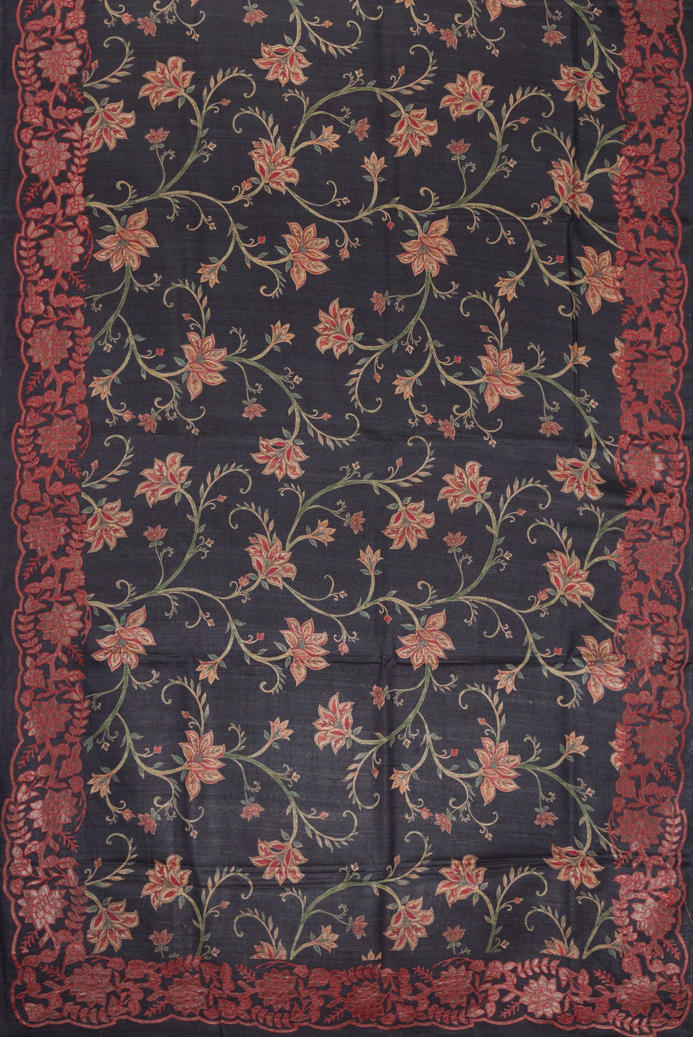 Flat view of Black Dual Tone Tussar Silk Saree with Printed design on the body and Embroidery Border. 
