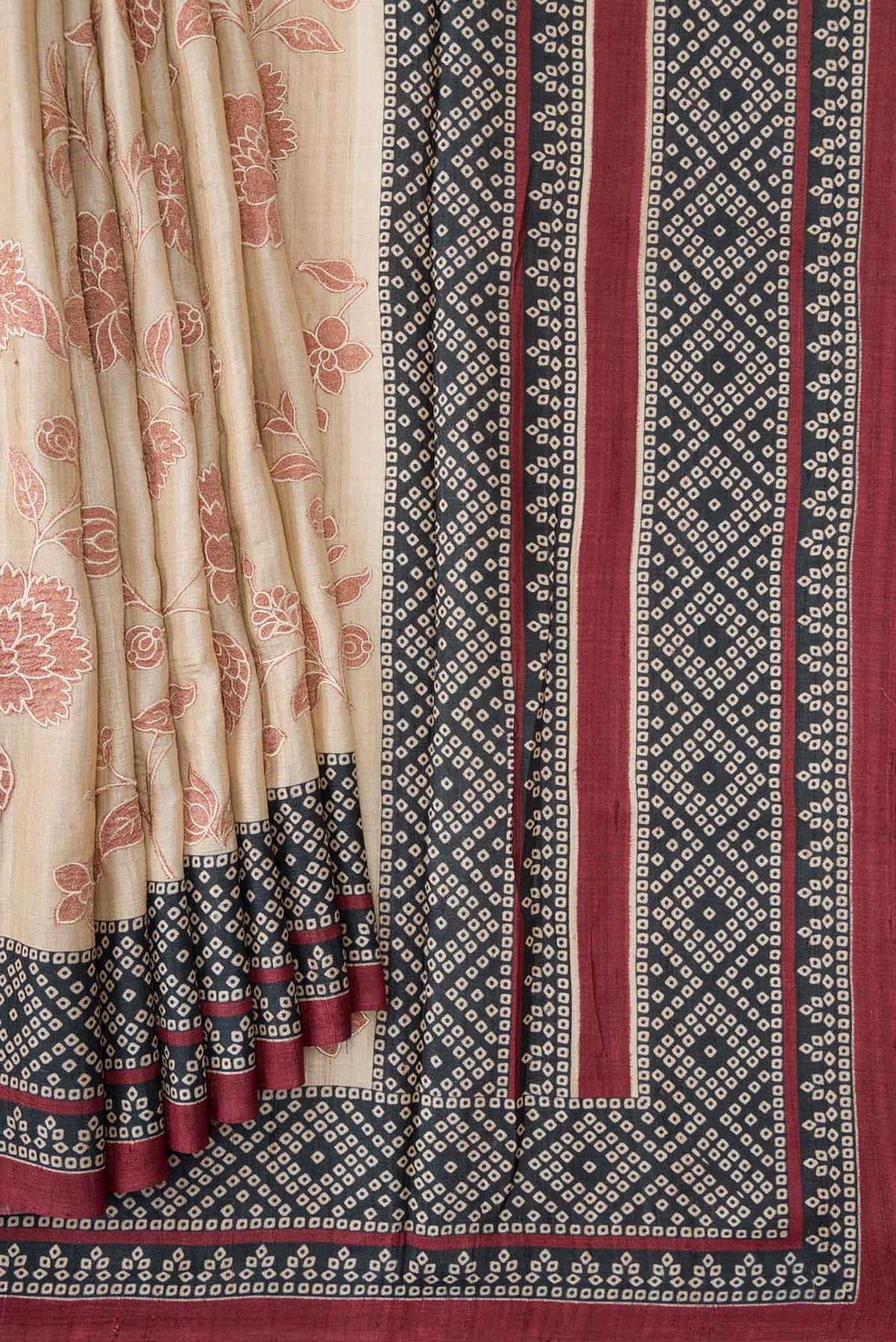 Pleats and pallu of Beige Dual Tone Tussar Silk Saree with Printed design on the body and Printed Border