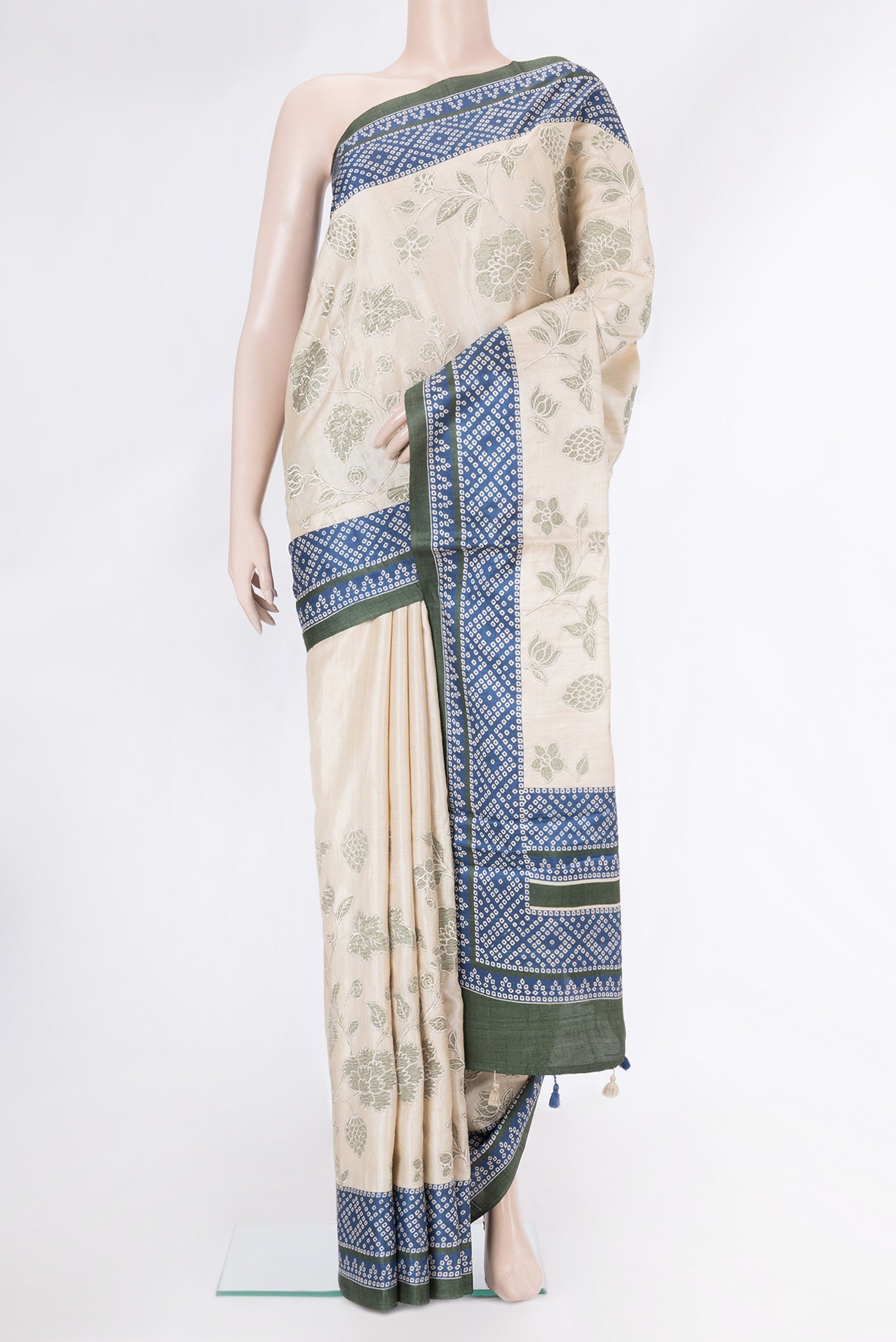 Beige Dual Tone Tussar Silk Saree with Embroidery on the body and Printed Border.  displayed on a mannequin