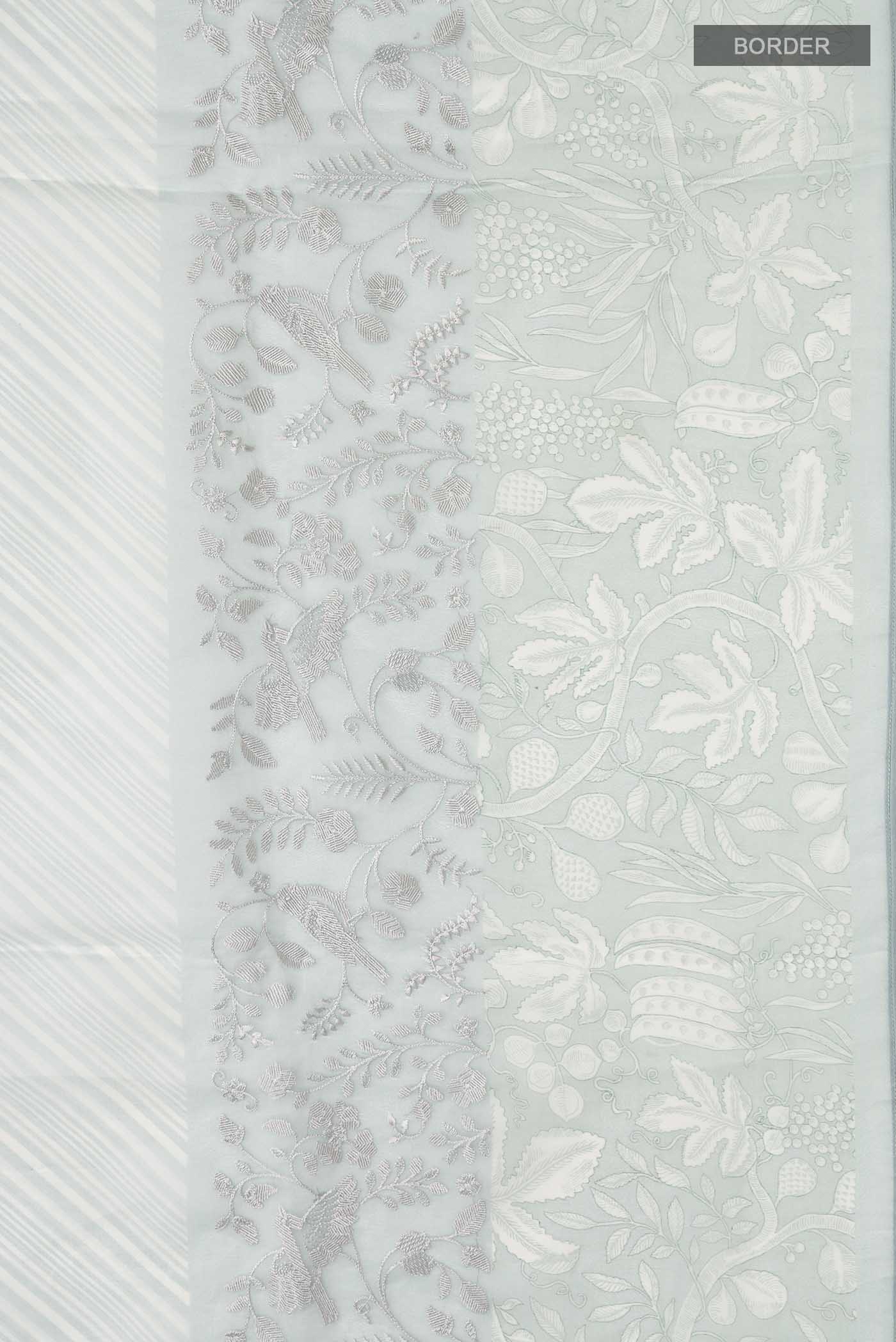Border image of Light Blue Organza Silk Saree with Printed design on the body and Printed Border