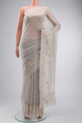 Silver Tissue Silk Saree with Plain Body and Embroidery Border displayed on a mannequin