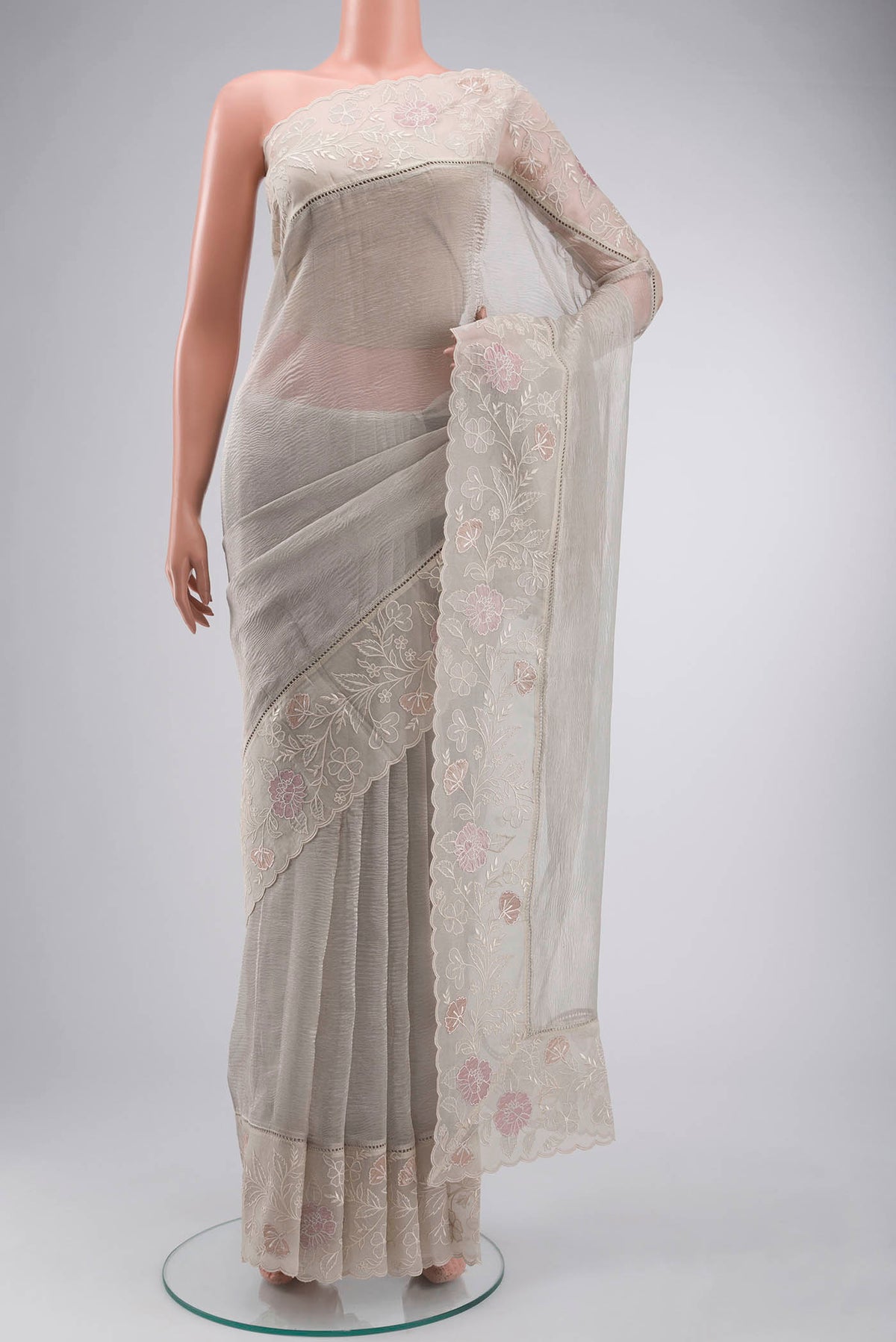 Silver Tissue Silk Saree with Plain Body and Embroidery Border displayed on a mannequin
