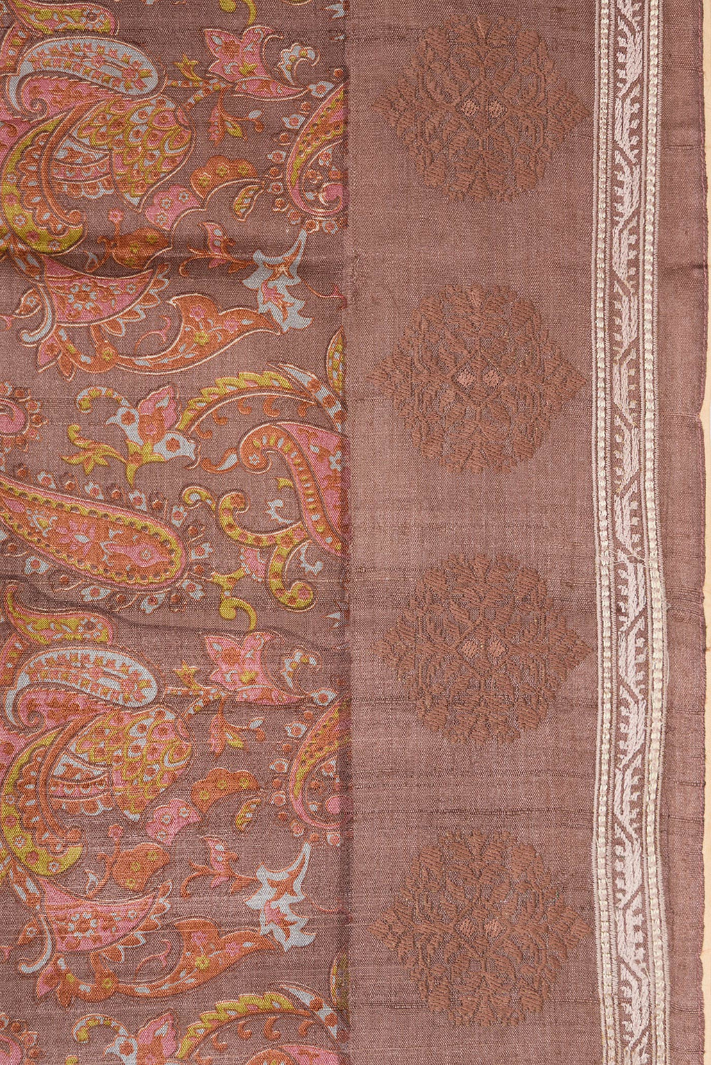 Border image of Brown Dual Tone Tussar Silk Saree with Printed design on the body and Embroidery Border. 