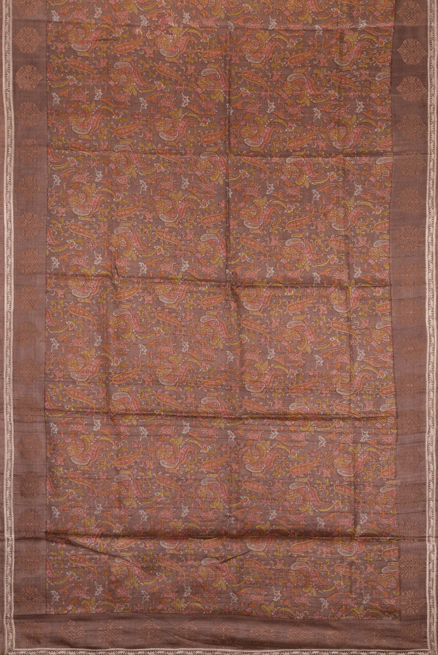 Flat view of Brown Dual Tone Tussar Silk Saree with Printed design on the body and Embroidery Border. 