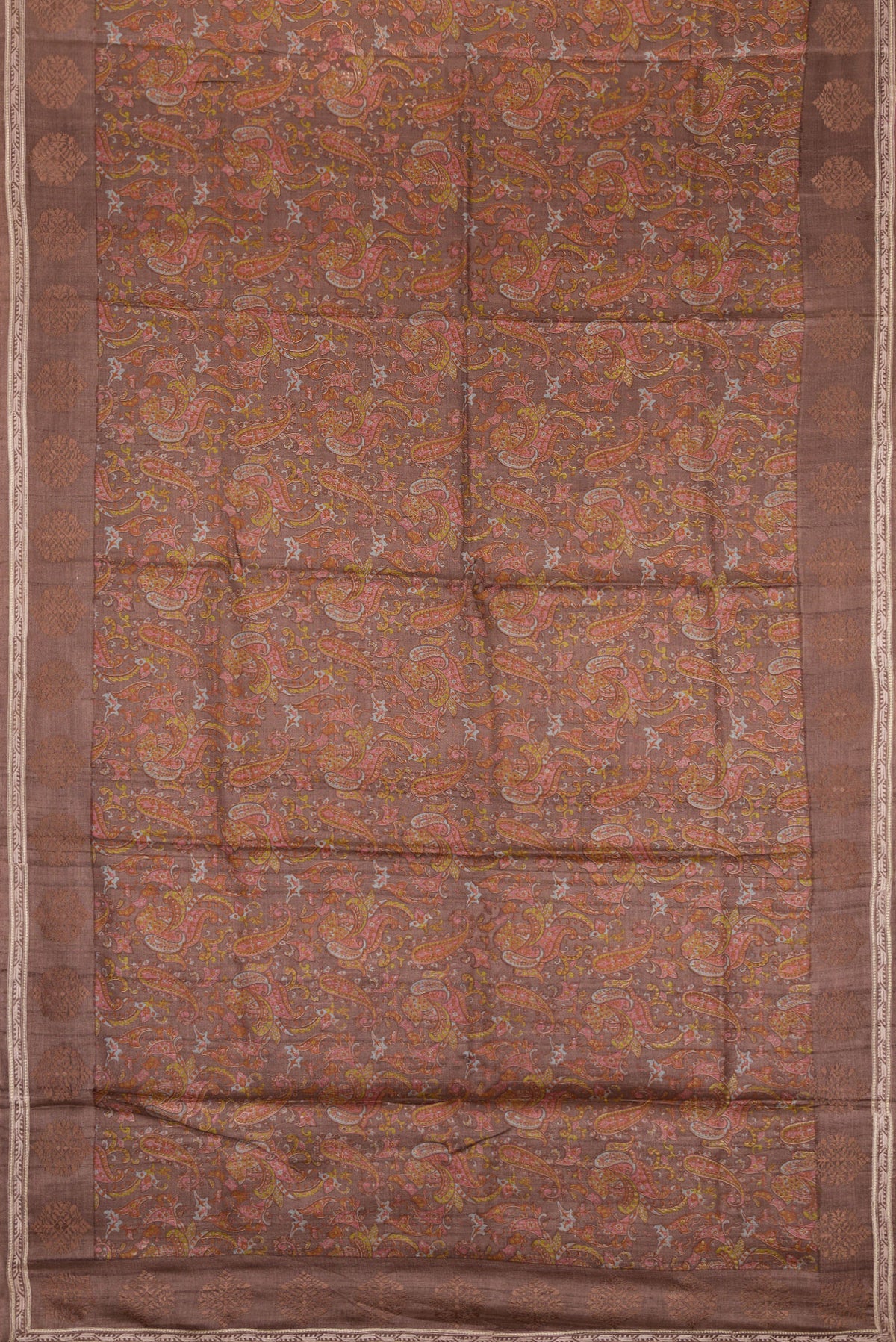 Flat view of Brown Dual Tone Tussar Silk Saree with Printed design on the body and Embroidery Border. 