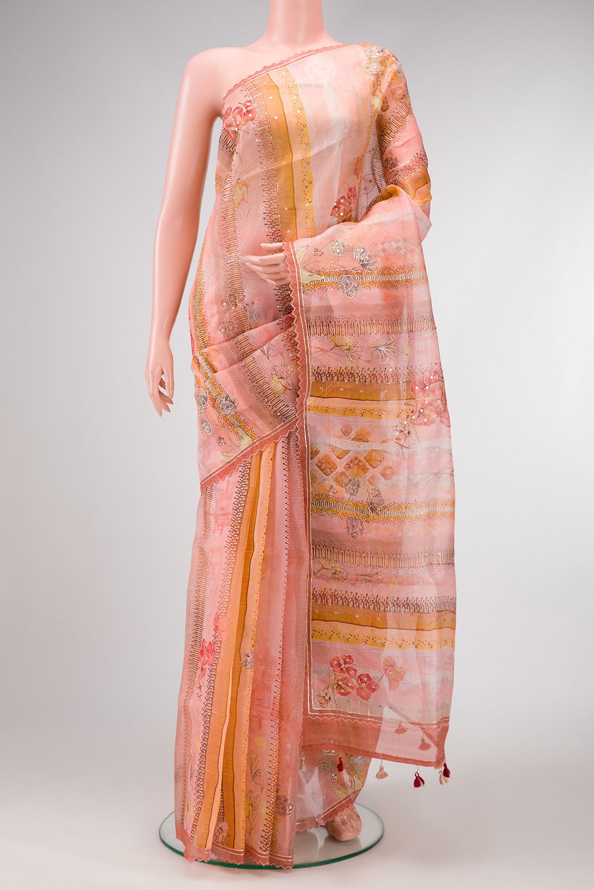 Pink Dual Tone Organza Silk Saree with Embroidery on the body and Embroidery Border.  displayed on a mannequin