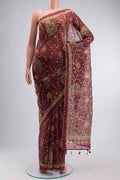 Maroon Organza Silk Saree with Floral Print on the body and Printed Border displayed on a mannequin
