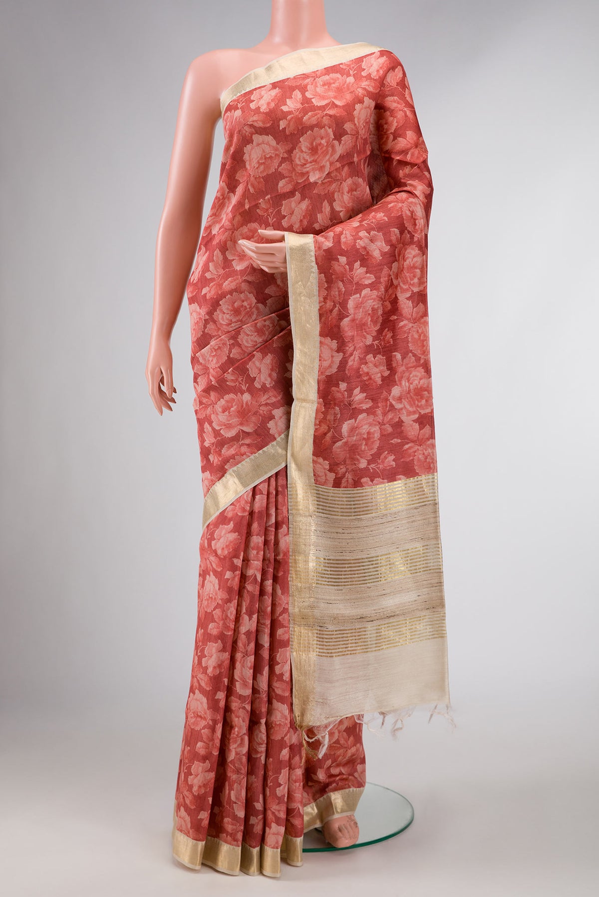 Dark Pink Dual Tone Tussar Silk Saree with Printed design on the body and Zari Border displayed on a mannequin