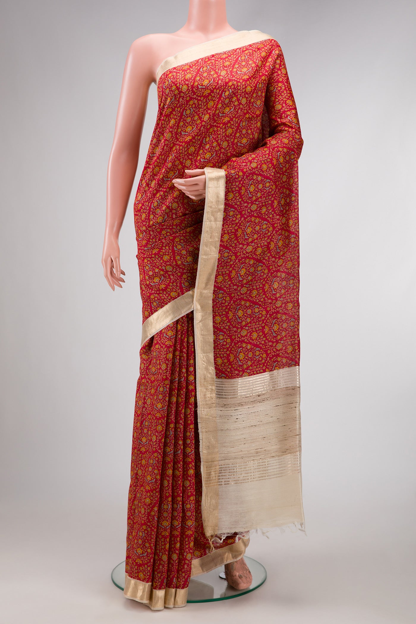 Maroon Dual Tone Tussar Silk Saree with Printed design on the body and Fancy Border.  displayed on a mannequin