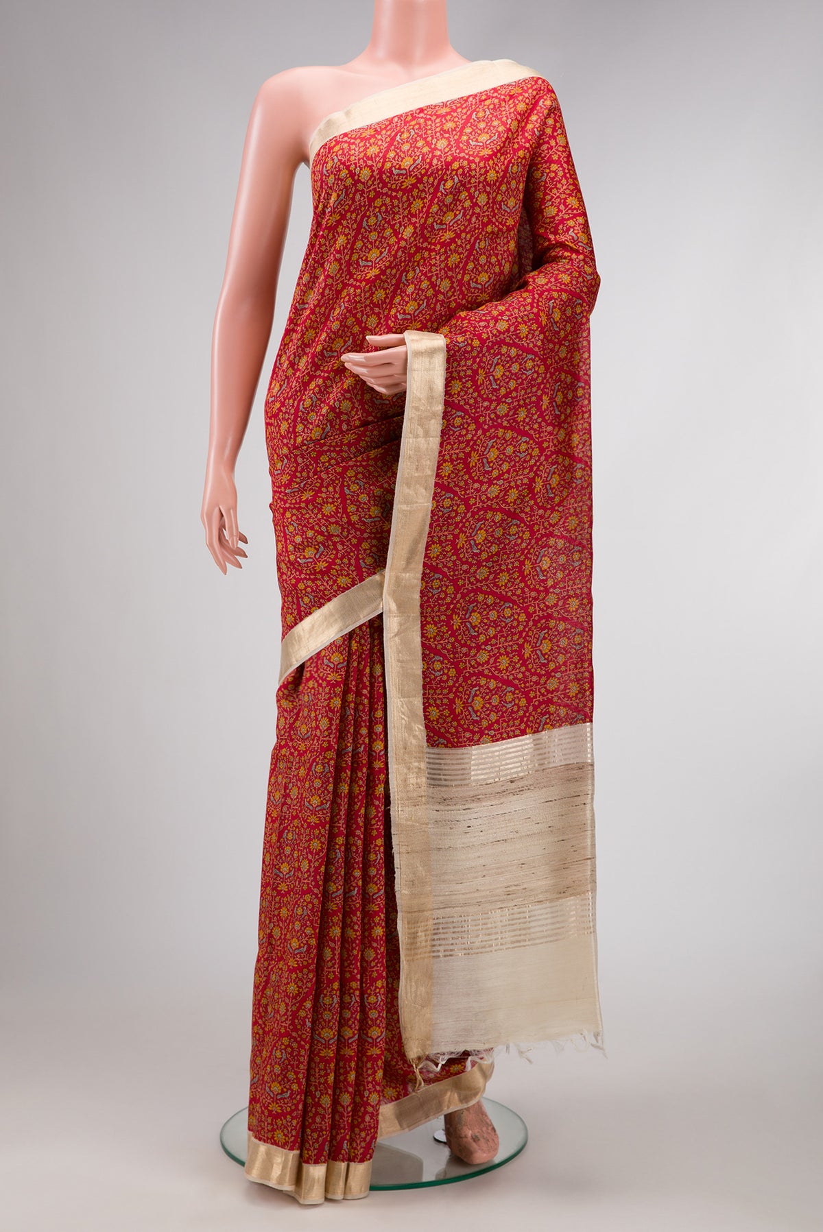 Maroon Dual Tone Tussar Silk Saree with Printed design on the body and Fancy Border.  displayed on a mannequin