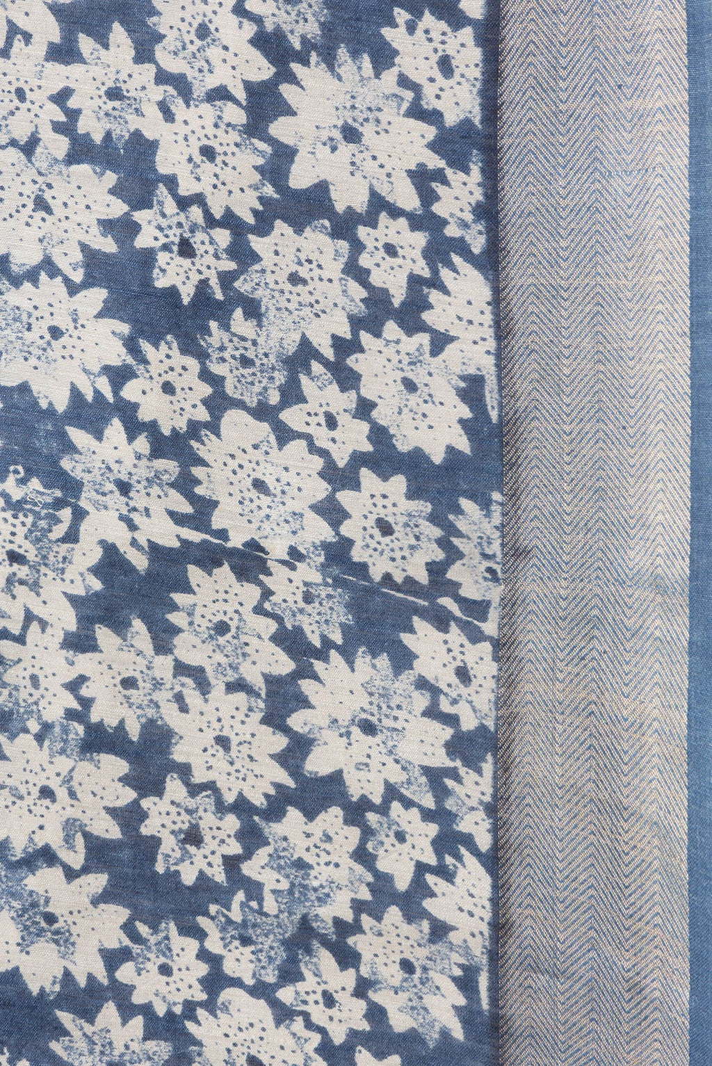Border image of Blue Dual Tone Tussar Silk Saree with Printed design on the body and Zari Border. 