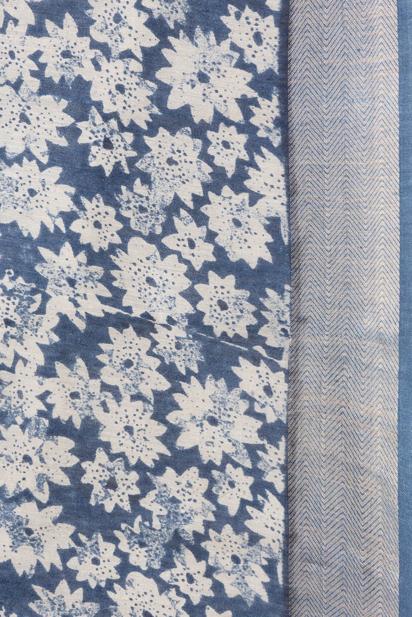 Border image of Blue Dual Tone Tussar Silk Saree with Printed design on the body and Zari Border. 