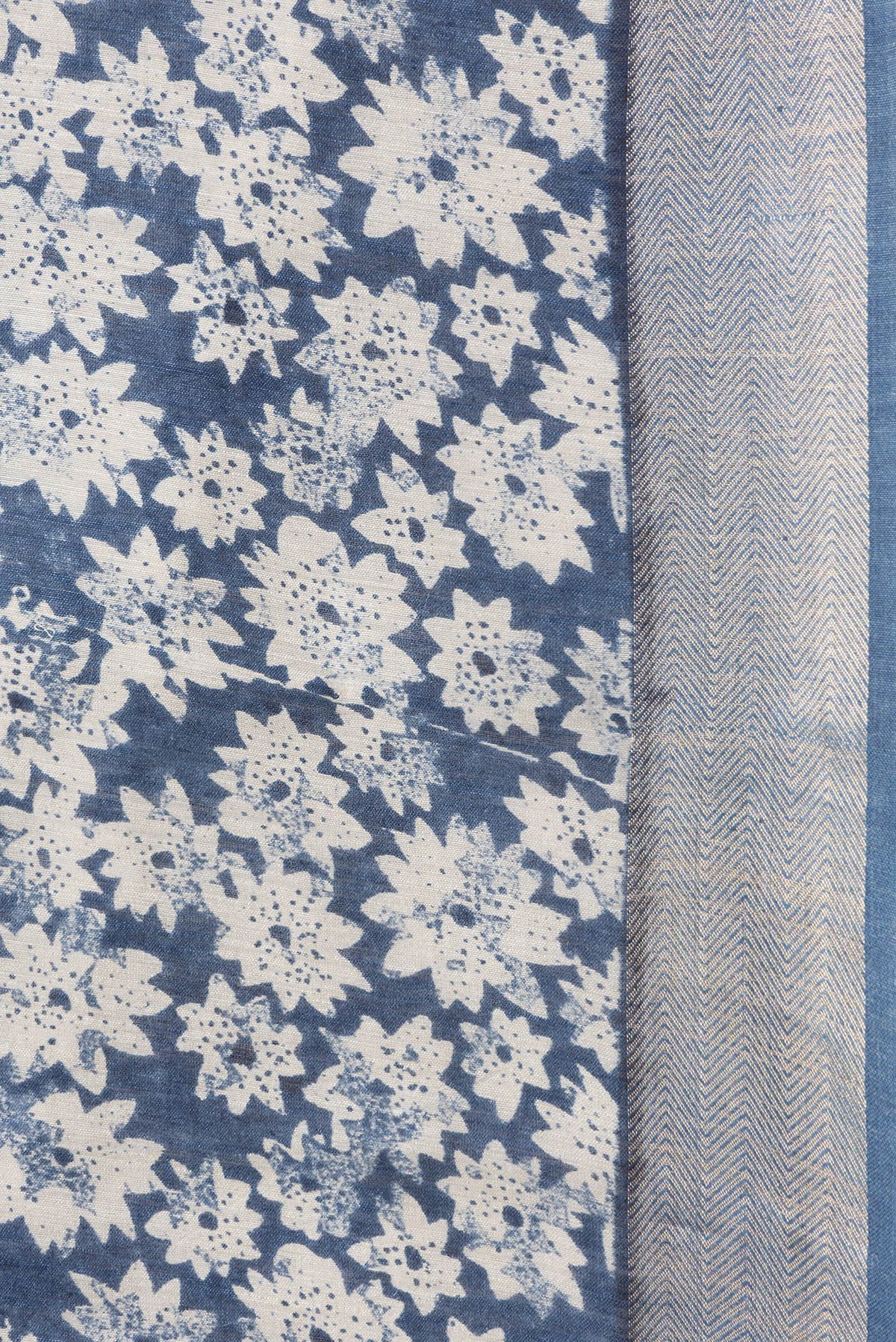 Border image of Blue Dual Tone Tussar Silk Saree with Printed design on the body and Zari Border. 