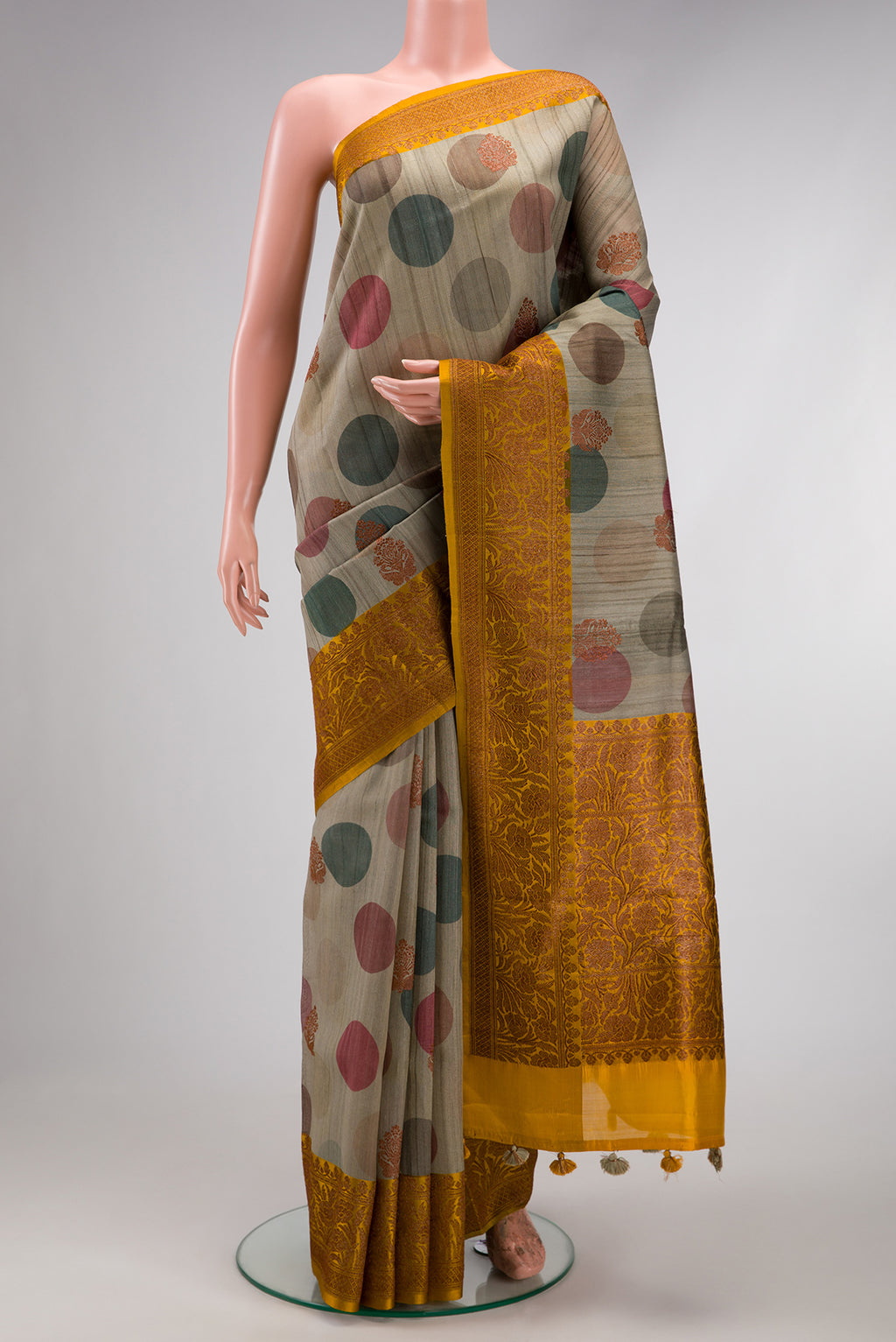 Grey Dual Tone Tussar Silk Saree with Printed design on the body and Fancy Border.  displayed on a mannequin
