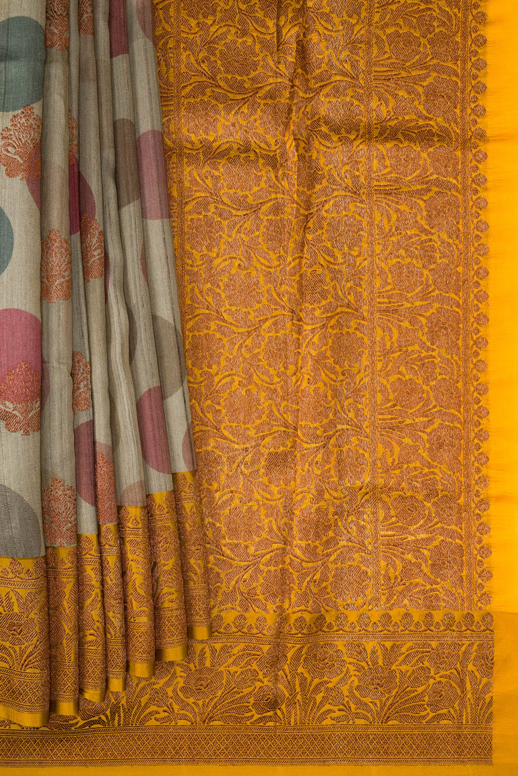 Pleats and pallu of Grey Dual Tone Tussar Silk Saree with Printed design on the body and Fancy Border. 