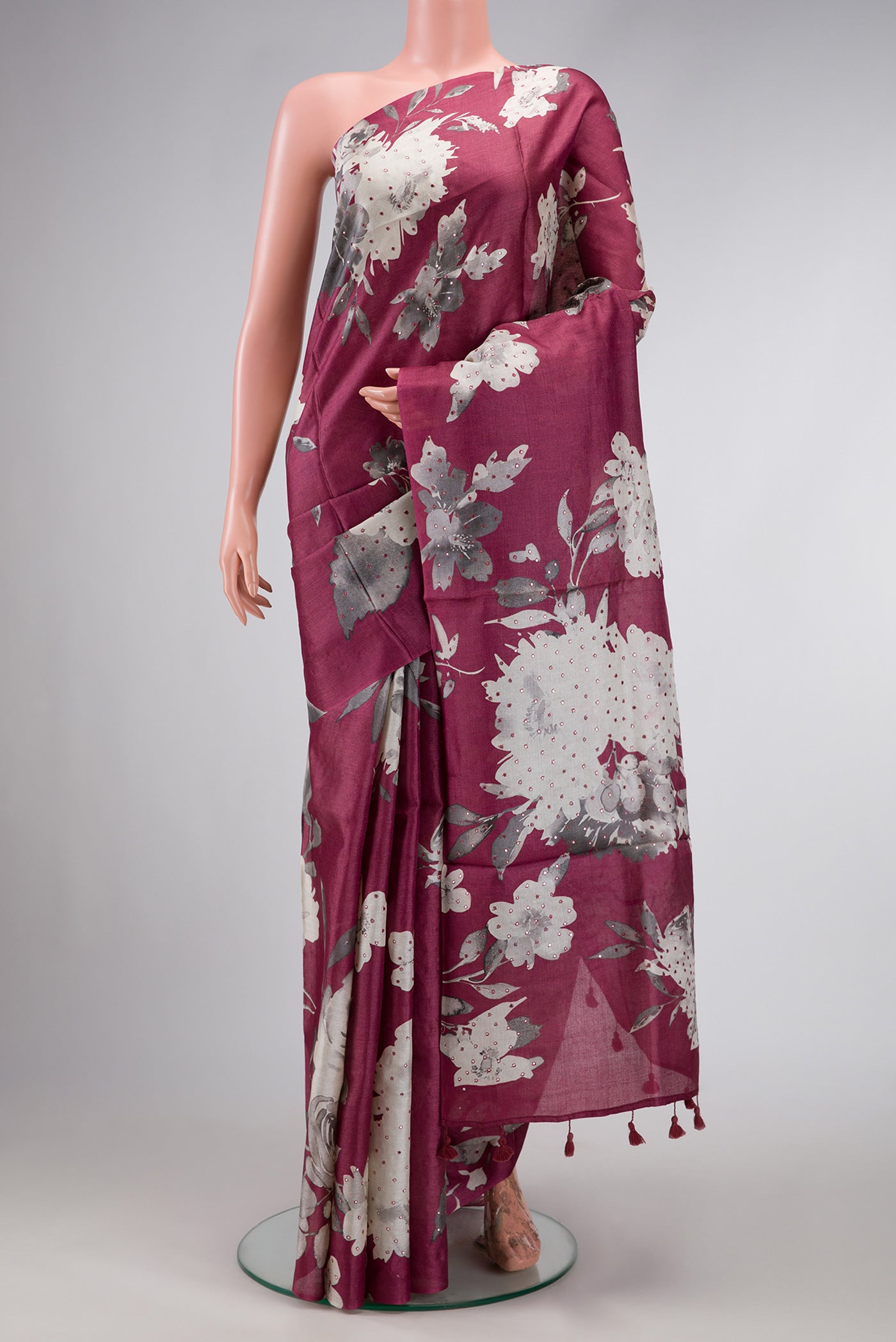 Mauve Dual Tone Tussar Silk Saree with Printed design on the body and Without Border.  displayed on a mannequin
