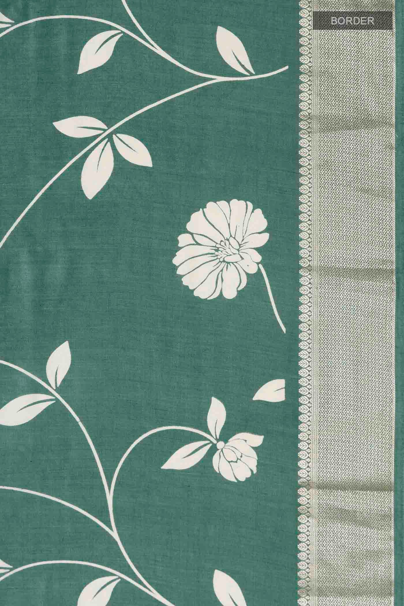 Border image of Green Tussar Silk Saree with Printed design on the body and Zari Border