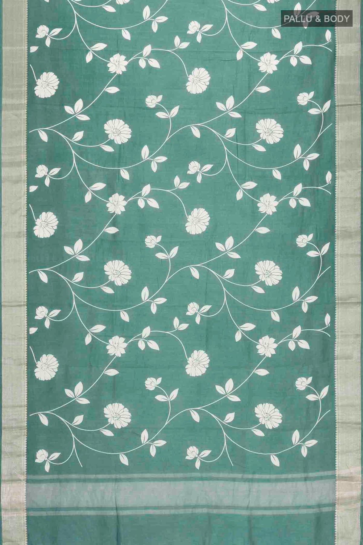 Flat view of Green Tussar Silk Saree with Printed design on the body and Zari Border