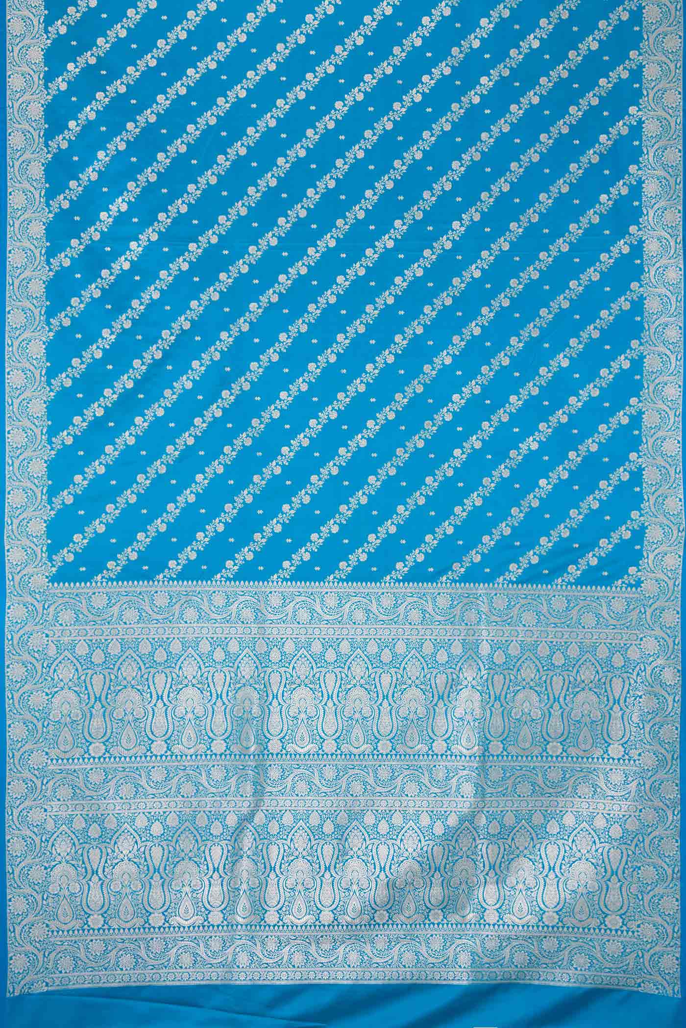 Flat view of Sky Blue Dual Tone Blended Banarasi Silk Saree with Zari Brocade on the body and Zari Border. 
