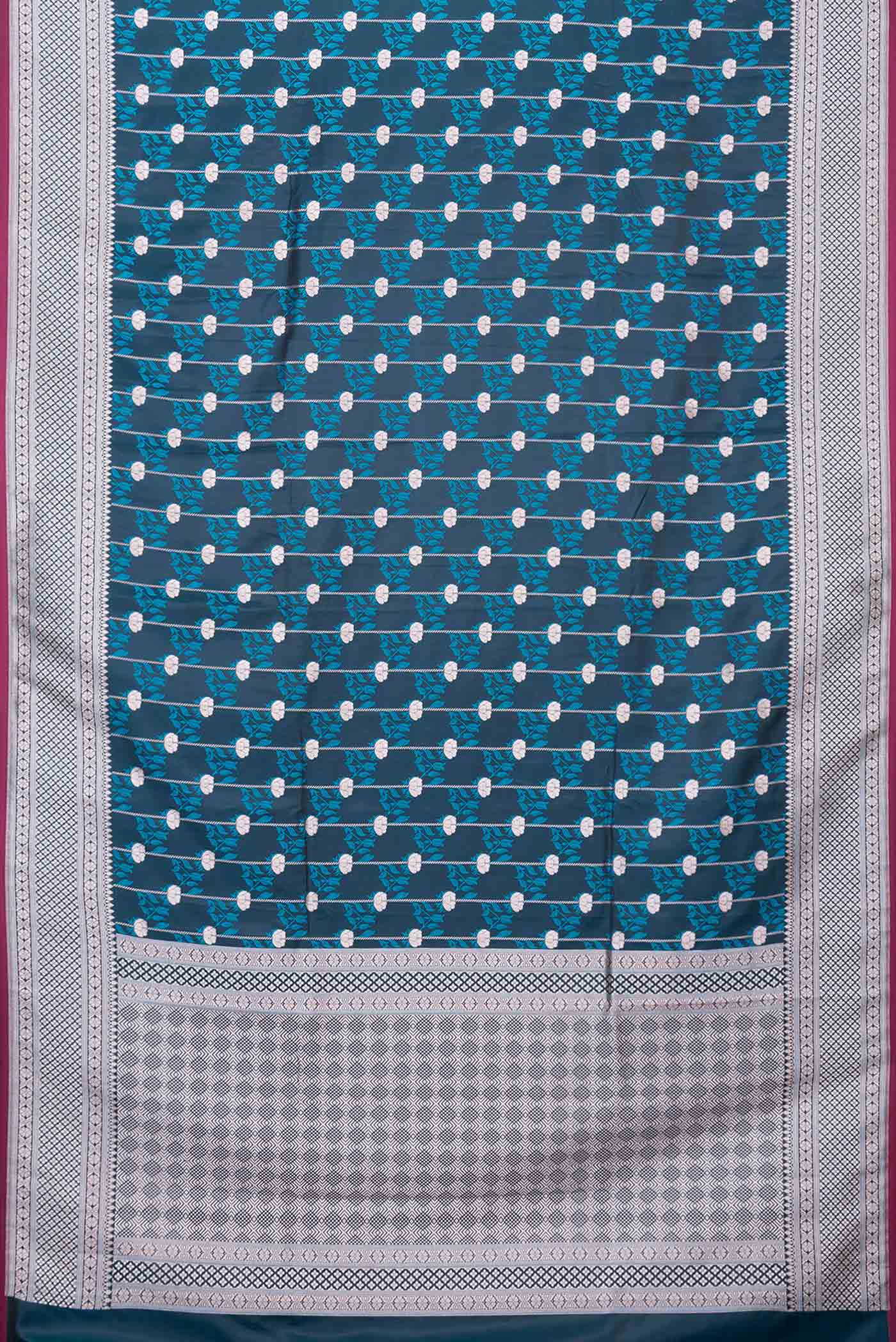 Flat view of Peacock Blue Dual Tone Blended Banarasi Silk Saree with Zari Butta on the body and Zari Border. 