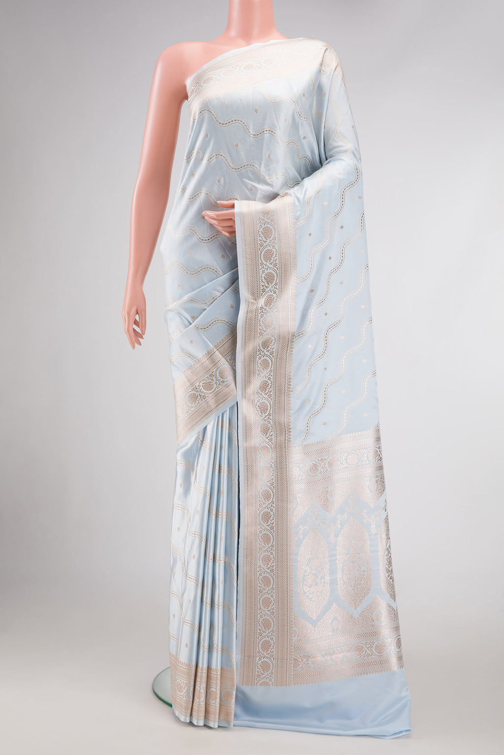 Grey Dual Tone Blended Banarasi Silk Saree with Zari Brocade on the body and Zari Border.  displayed on a mannequin