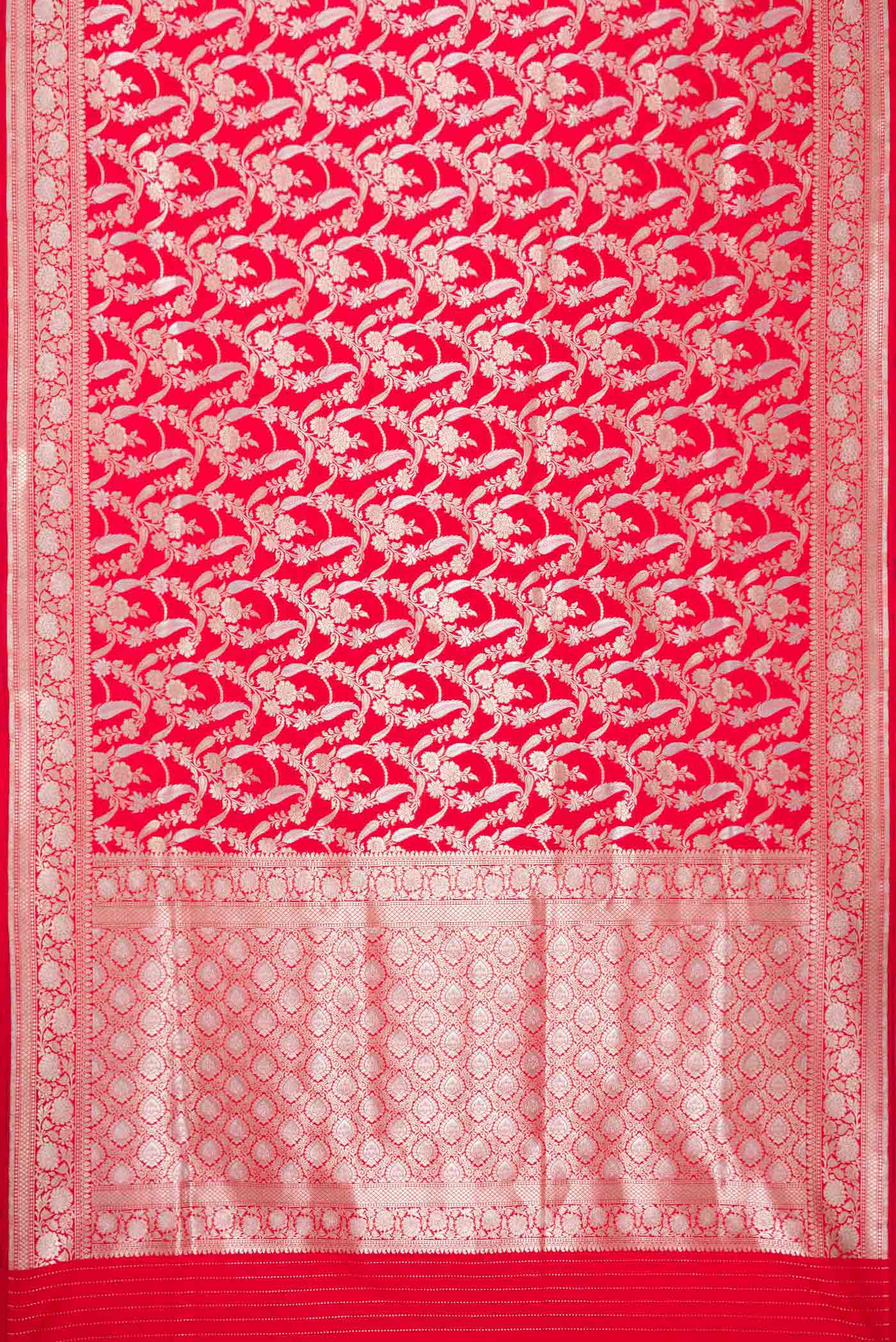 Flat view of Red Dual Tone Blended Banarasi Silk Saree with Zari Brocade on the body and Zari Border. 