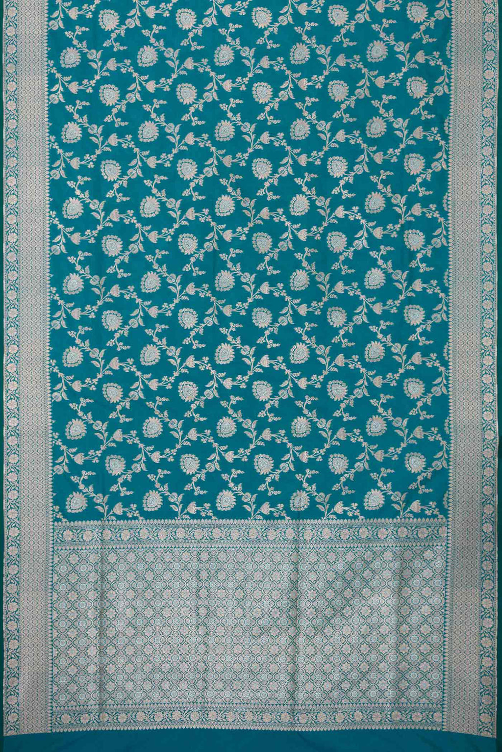 Flat view of Peacock Blue Dual Tone Blended Banarasi Silk Saree with Zari Brocade on the body and Zari Border. 
