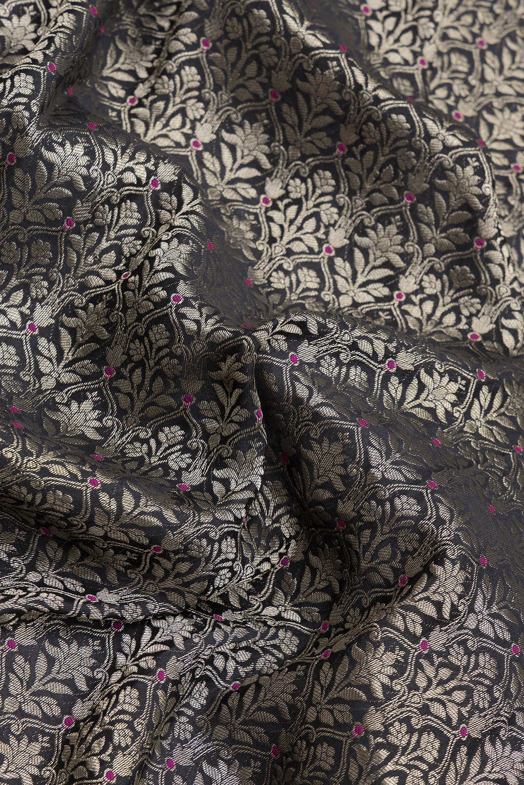 Close up of Black Dual Tone Banarasi Georgette Saree with Zari Brocade on the body and Zari Border.  displaying folds