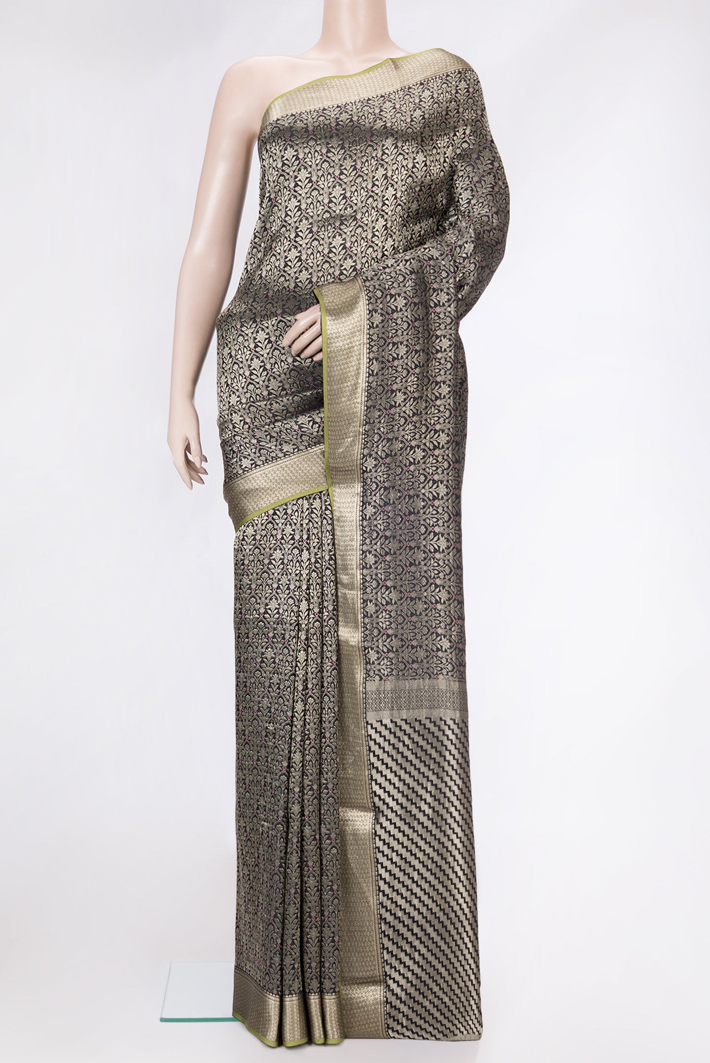 Black Dual Tone Banarasi Georgette Saree with Zari Brocade on the body and Zari Border.  displayed on a mannequin