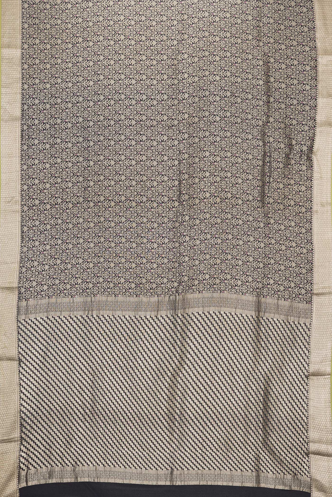 Flat view of Black Dual Tone Banarasi Georgette Saree with Zari Brocade on the body and Zari Border. 