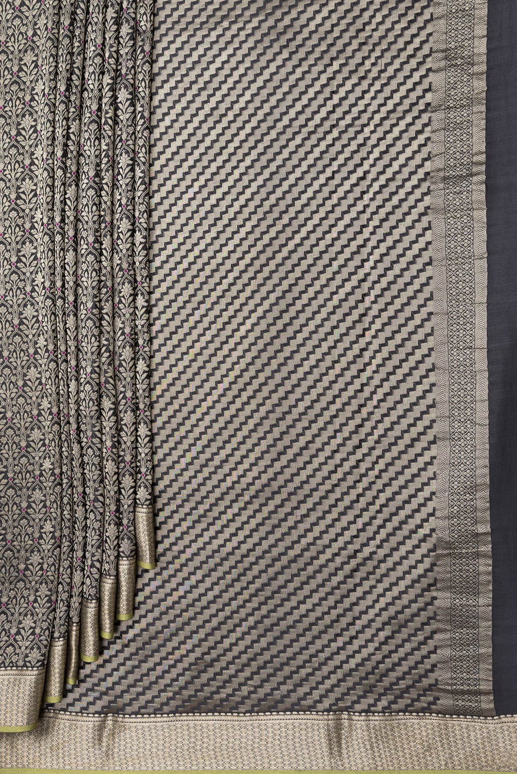 Pleats and pallu of Black Dual Tone Banarasi Georgette Saree with Zari Brocade on the body and Zari Border. 