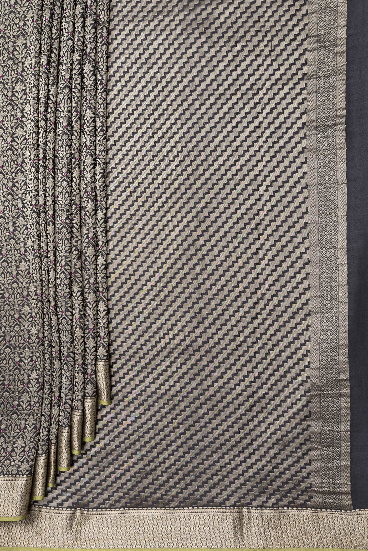Pleats and pallu of Black Dual Tone Banarasi Georgette Saree with Zari Brocade on the body and Zari Border. 