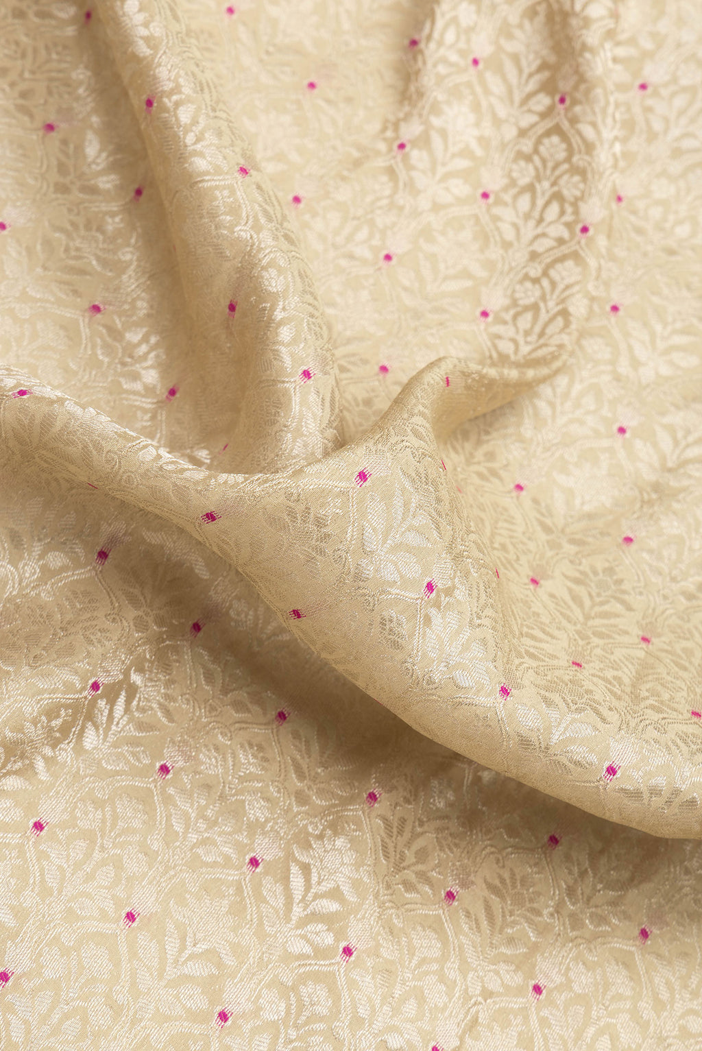 Close up of Pista Green Dual Tone Banarasi Georgette Saree with Zari Brocade on the body and Zari Border.  displaying folds