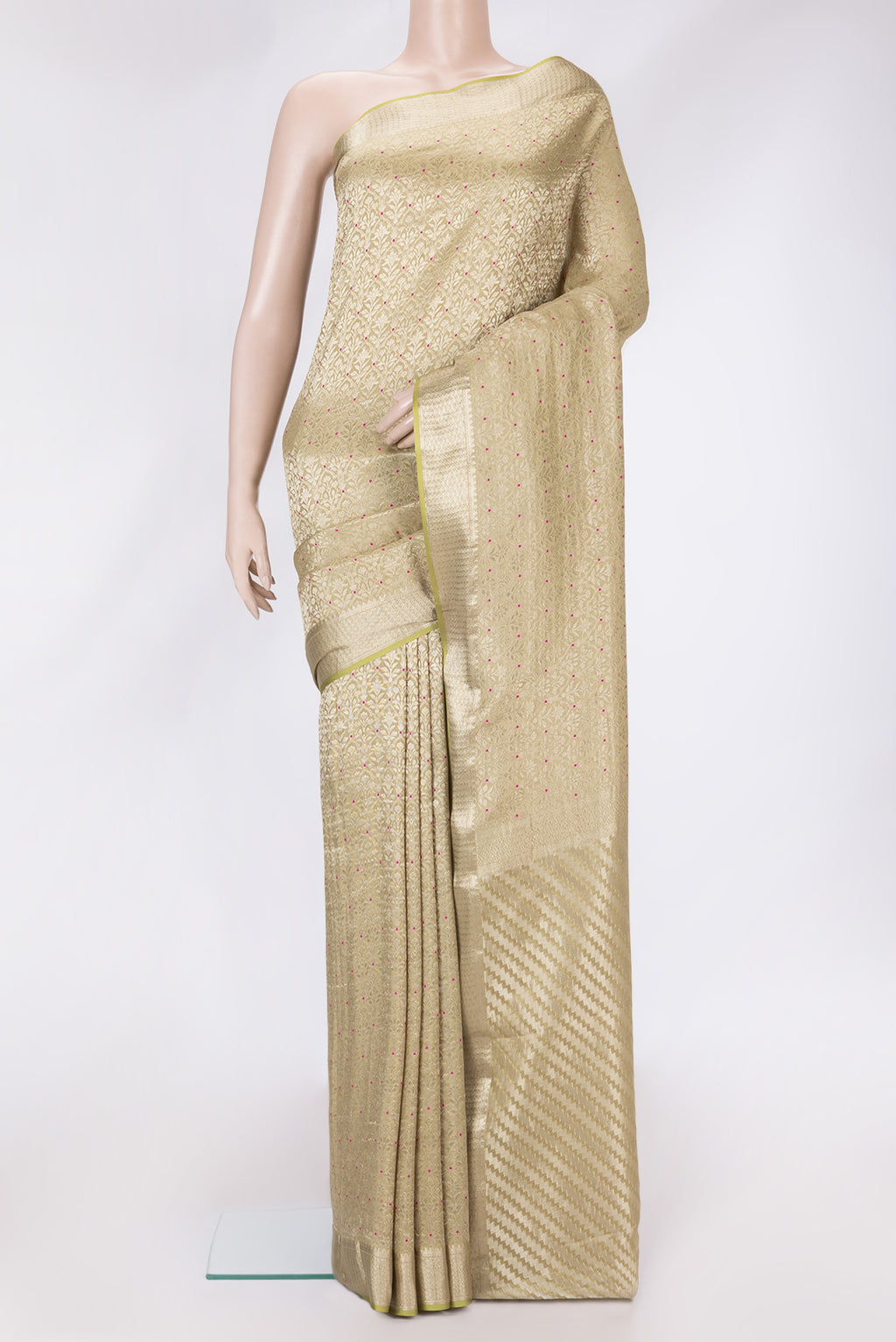 Pista Green Dual Tone Banarasi Georgette Saree with Zari Brocade on the body and Zari Border.  displayed on a mannequin