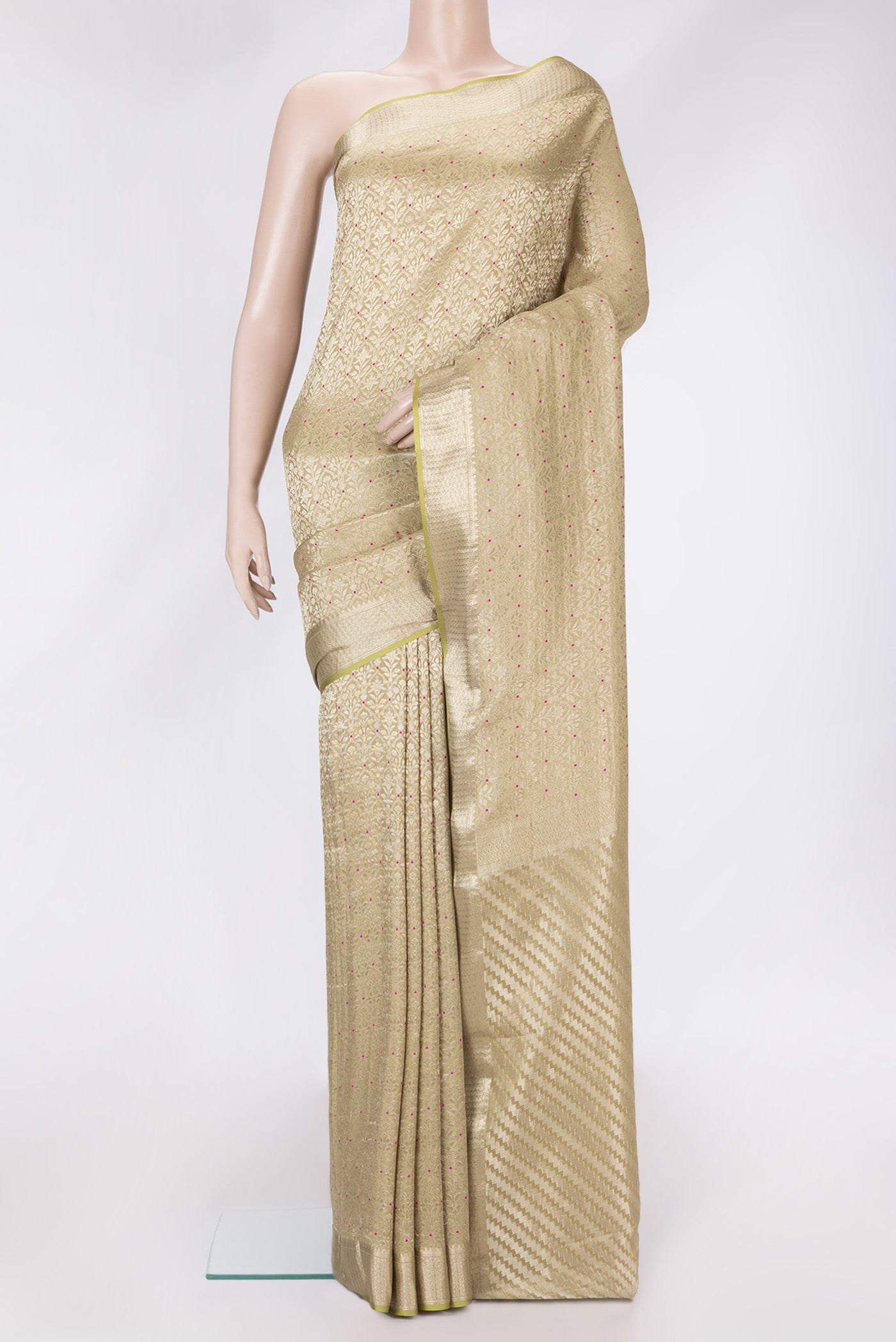 Pista Green Dual Tone Banarasi Georgette Saree with Zari Brocade on the body and Zari Border.  displayed on a mannequin