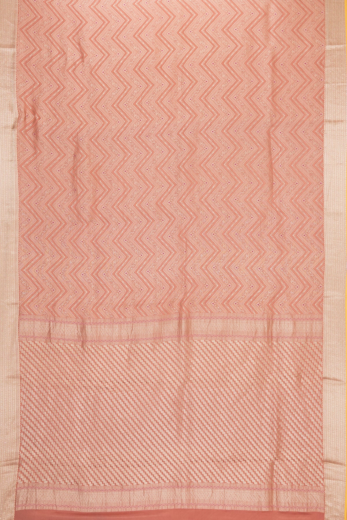 Flat view of Brick Orange Dual Tone Banarasi Georgette Saree with Zari Brocade on the body and Zari Border. 
