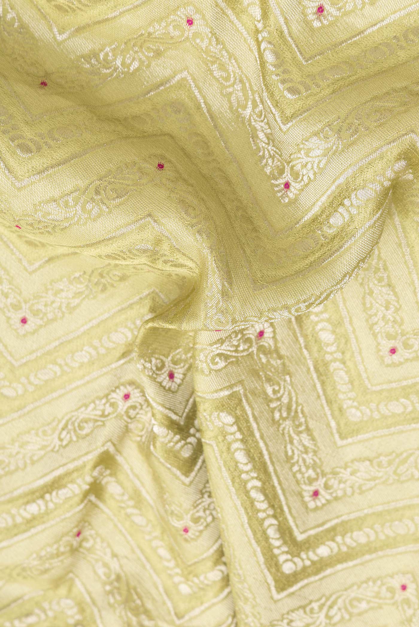Close up of Parrot Green Dual Tone Banarasi Georgette Saree with Zari Brocade on the body and Zari Border.  displaying folds