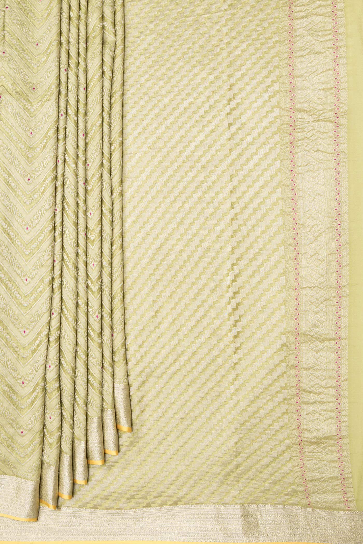 Pleats and pallu of Parrot Green Dual Tone Banarasi Georgette Saree with Zari Brocade on the body and Zari Border. 