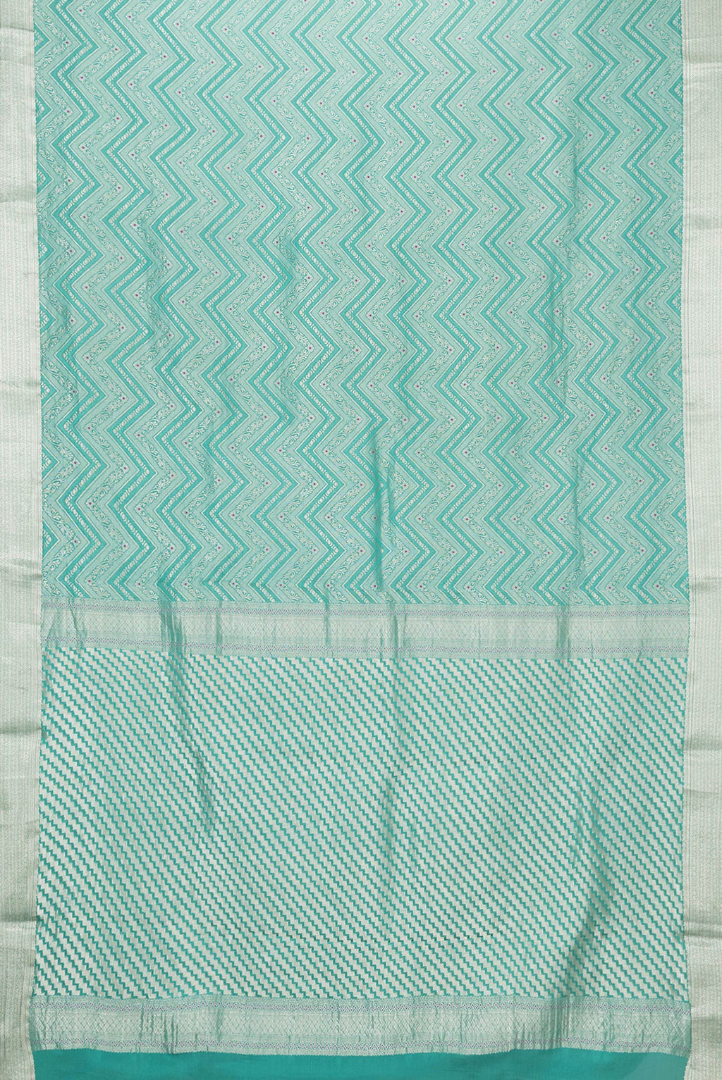 Flat view of Sea Green Dual Tone Tussar Silk Saree with Zari Brocade on the body and Zari Border. 